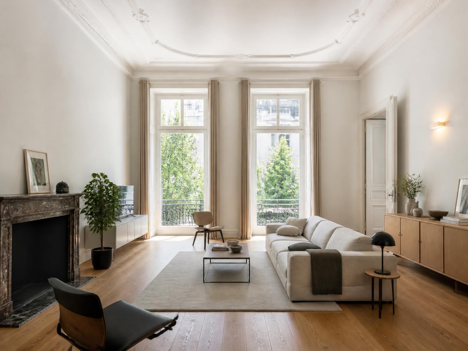 Restored living room with high ceiling in an Antwerp town-house